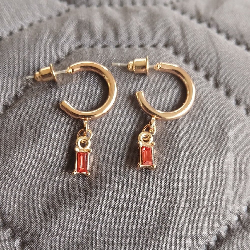 Elegant Gold Hoop Earrings with Red Gemstone Charm